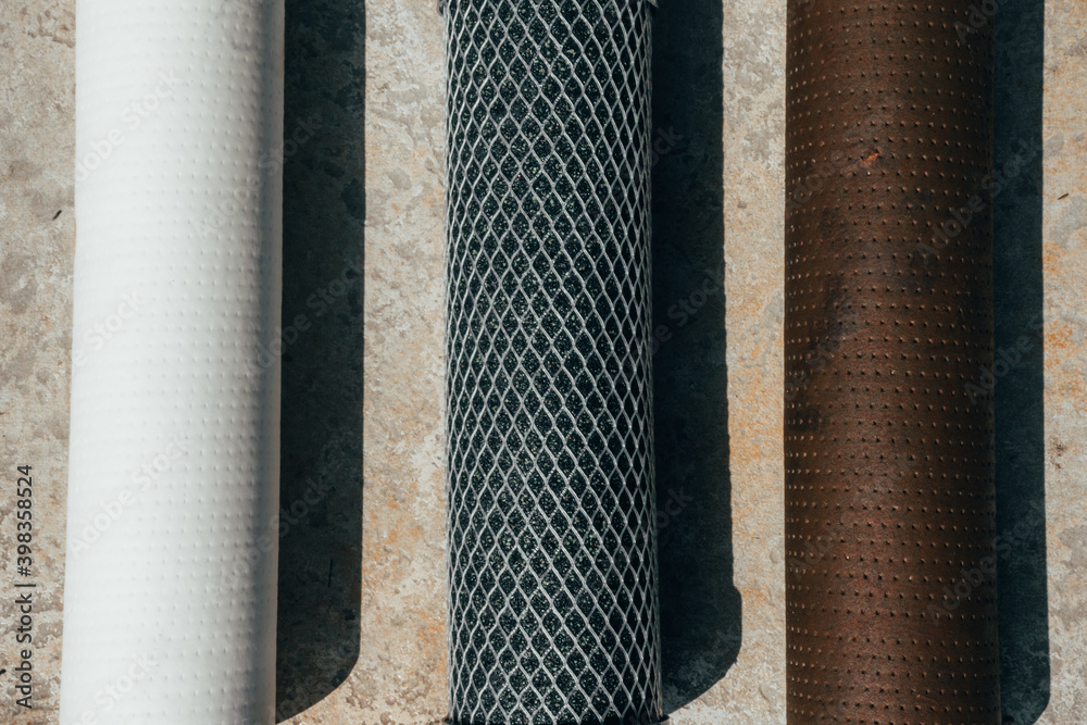 Water filter cartridge white new, with coal and used with rusty ...