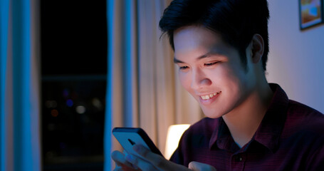 man Use Smart Phone Happily