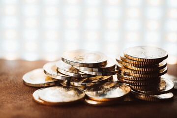 Abstracgt blur of stack coins using as business banking, stock exchange and financial concept - Vintage filter