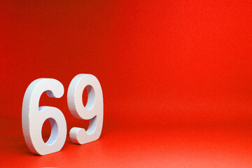 69 ( Sixty nine ) Isolated red Background with Copy Space - Number 69% Percentage or Promotion - Discount or anniversary concept 