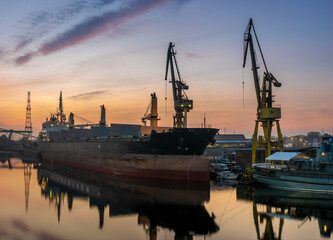 Canvas Print - cargo ship in a shipyard