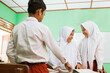 © Odua Images - portraits of islamic school students have a discussion in the class