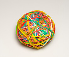 A Ball Made Of Rubber Bands Isolated On White. Rubber Bands Ball. Selective Focus.