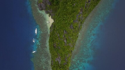 Wall Mural - Aerial top down view of beautiful scenery around El Nido, Palawan Island, Philippines. El Nido is famous for its island hopping and snorkeling tours to unspoiled beaches and lagoons.