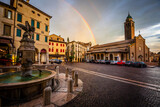 Fototapeta  - Dark clouds and a rainbow over the village of Asolo in Venetian, Italy
