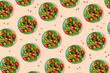 © gemma ferrando & jeremie roman/Westend61 - Pattern of plates of fresh ready-to-eat vegan salad