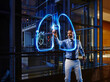 © Roger Richter Photography/Westend61 - Male pulmonologist light painting lung in laboratory at hospital