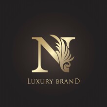 Luxury Letter N Logo Gold Monogram Feather Decorative Ornate Ornament Vector Design