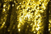 Festive Background Of Trendy Yellow Sequins.