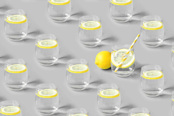 Wall Mural - Pattern of glass of lemonade a gray background. Colors 2021.