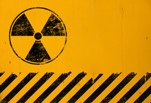 Black Radioactive Sign Over Yellow Background