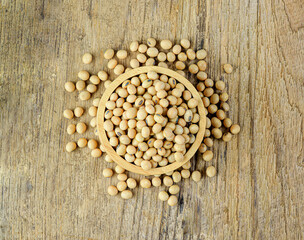 Wall Mural - soy bean in wooden  cup  on wood table