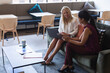 © Wavebreak Media - Diverse businesswomen using laptop during video call in creative office