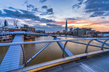 Canvas Print - London skyline at sunrise seen from Millenium bridge. England 