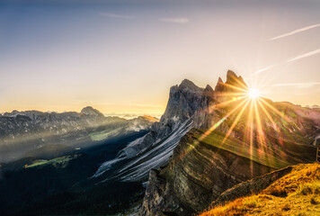 Poster - Amazing sunrise of Seceda peak with sun flare. Trentino Alto Adige, Dolomites Alps, South Tyrol, Italy, Europe