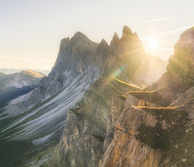 Poster - Amazing misty sunrise of Seceda peak with sun flare. Trentino Alto Adige, Dolomites Alps, South Tyrol, Italy, Europe