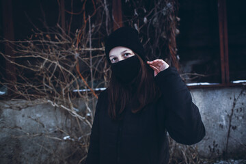 Young Lonely Girl with Quarantine Mask