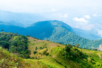 beautiful mountain layer with clouds and blue sky