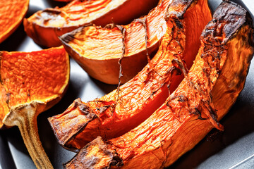 sliced butternut squash roasted in an oven