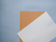 © kristina - flat sheets of pink brown and gray paper. top view. copy space. flat lay.