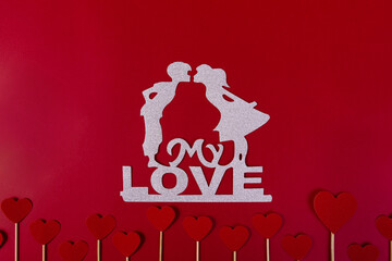 Sticker - Top view shot of glitter sticker of boy and girl kissing on the text 