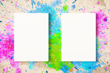 Two blank posters hanging on a concrete wall with colorful watercolor splatters on them. Mockup. 3d rendering