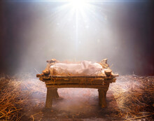 Fog And Empty Manger With Light Falling On It  -  Waiting For The Messiah