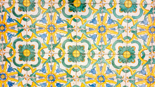 Typical Colorful Sicilian Floor And Wall Tiles In Different Patterns And Designs. The Main Colors Are Yellow, White, Blue And Green.