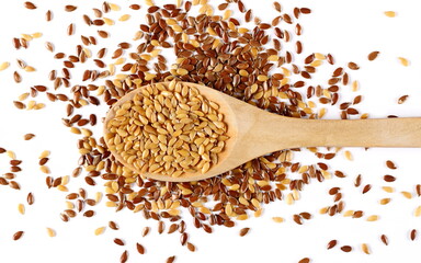 Wall Mural - Mix golden linseed and brown flaxseeds, pile in wooden spoon isolated on white background, top view