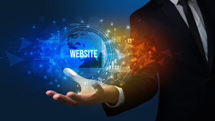 Elegant hand holding WEBSITE inscription, digital technology concept