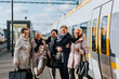 © Johnér - Women on train station platform