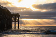 © tomas del amo - sunset by a california pier