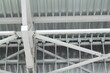 © Stanislav - An old steel metal farm. structure of metal structure of frame-type industrial building. Lightweight metal frame construction.