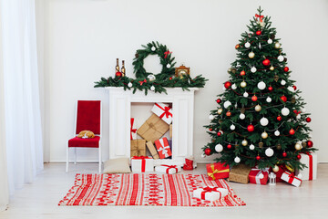 Wall Mural - beautiful Christmas Christmas tree interior with gifts new year decor December