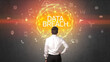 © ra2 studio - Rear view of a businessman with DATA BREACH inscription, online security concept