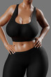 © PixlMakr - Young slim woman with big breasts in black sportswear