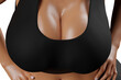 © PixlMakr - Young slim woman with big breasts in black sportswear
