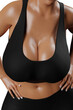 © PixlMakr - Young slim woman with big breasts in black sportswear