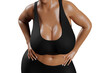 © PixlMakr - Young slim woman with big breasts in black sportswear