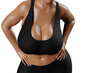 © PixlMakr - Young slim woman with big breasts in black sportswear