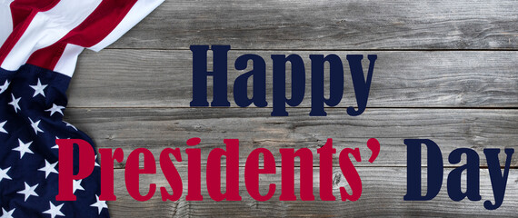 Wall Mural - Happy Presidents Day text with draped US flag on left side of natural rustic wood