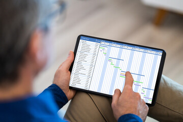 Poster - Man Using Gantt Chart Schedule Software