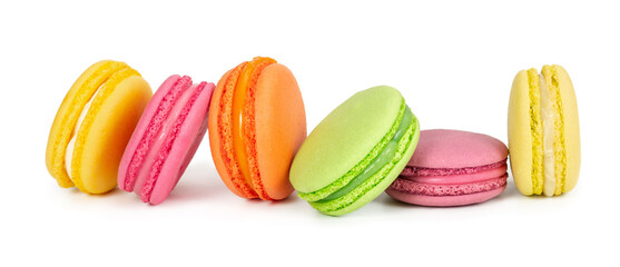 Wall Mural - Colorful french macaroons in row isolated on white