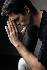 Portrait of a handsome young man. Studio photography. Loft