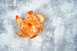 Mandarin on light concrete background. Top view, flat lay, copy space. Recipe, diet, nutrition concept.