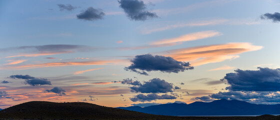Wall Mural - beautiful lenticular clouds at sunrise over the mountains - for sky replacement