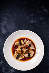 Canvas Print - Fried dumplings, pierogi with meat filling sprinkled, top view