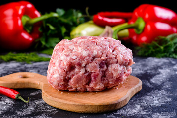 Wall Mural - minced pork uncooked on wood block, minced pork