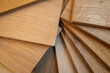 © Peeradontax - Top view, selective focus of light Engineered hardwood or laminate flooring samples.