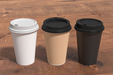 White, cardboard and black take away coffee paper cups mock up with lids on wooden background.